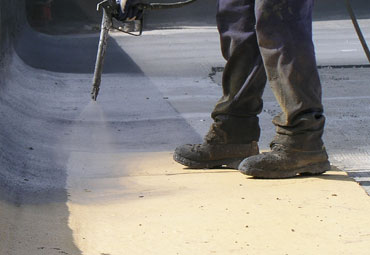 Coating systems over Albuquerque spray foam roof systems